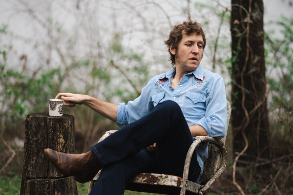 Mac Leaphart tries out a new chair.