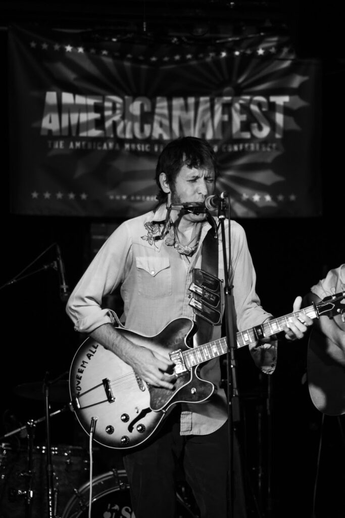 Mac Leaphart uses one of three harmonicas.